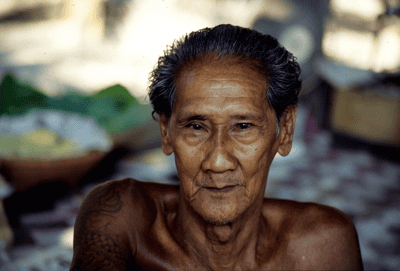 The tattooed man of the Ratchaburi Floating Market The tattooed man of the Ratchaburi Floating Market