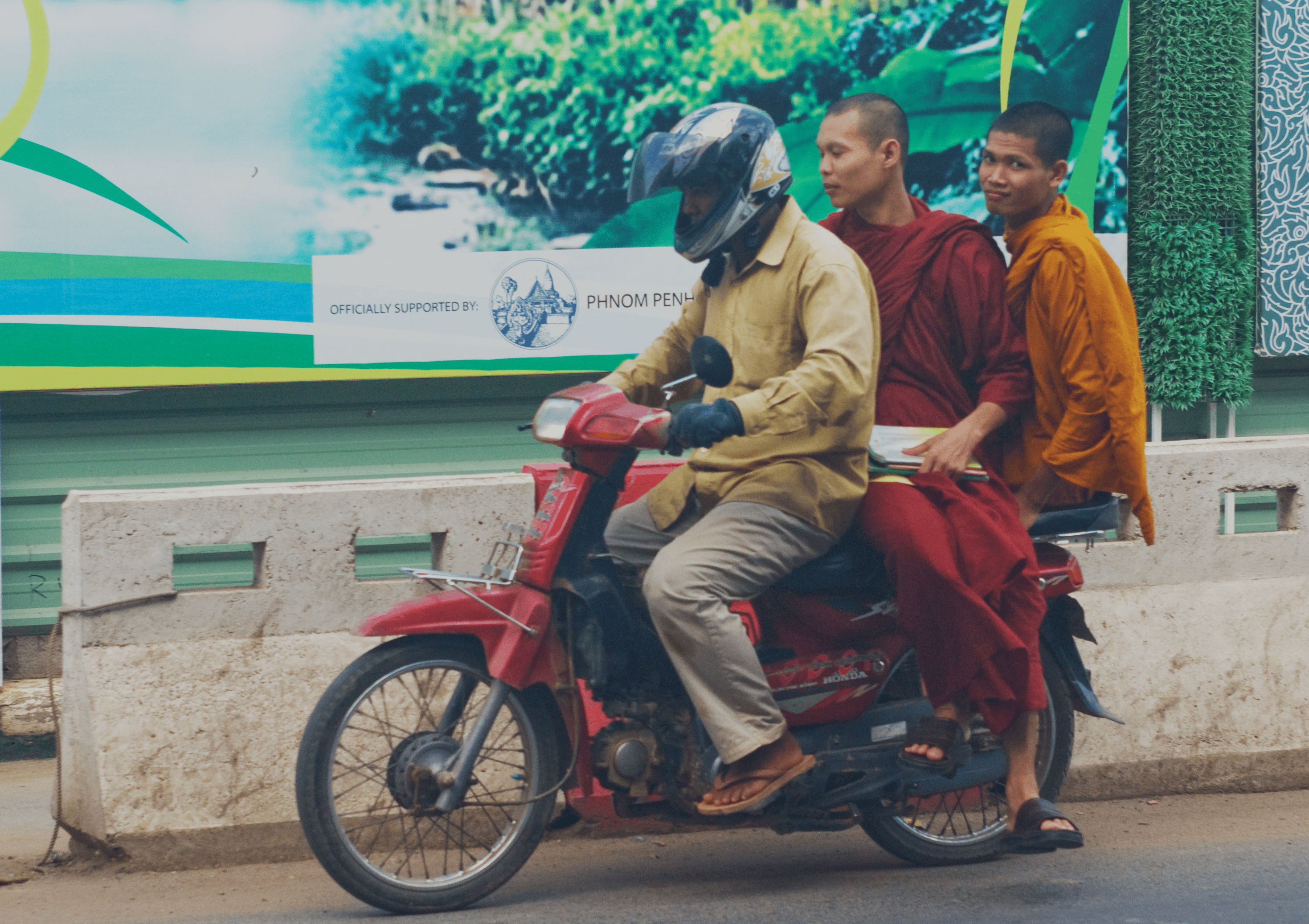 Monks on Motorcycles, Phnom Penh, Cambodia Monks on Motorcycles, Phnom Penh, Cambodia