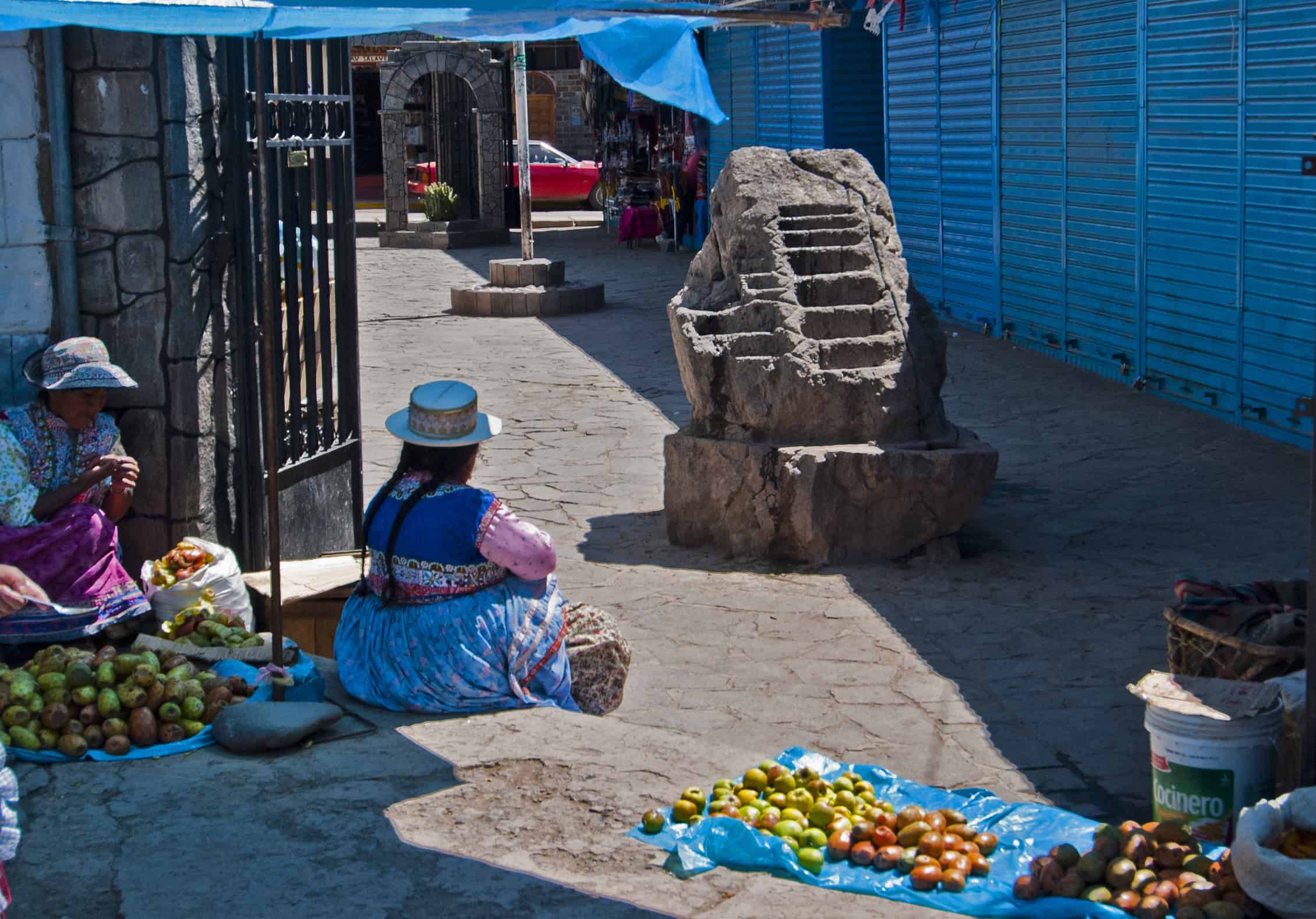 Market Scene, Chivay. Note the Inca rock that shows terracing and irrigation techniques. (2011) Photo (c) Karen Abrahamson Market Scene, Chivay. Note the Inca rock that shows terracing and irrigation techniques. (2011) Photo (c) Karen Abrahamson